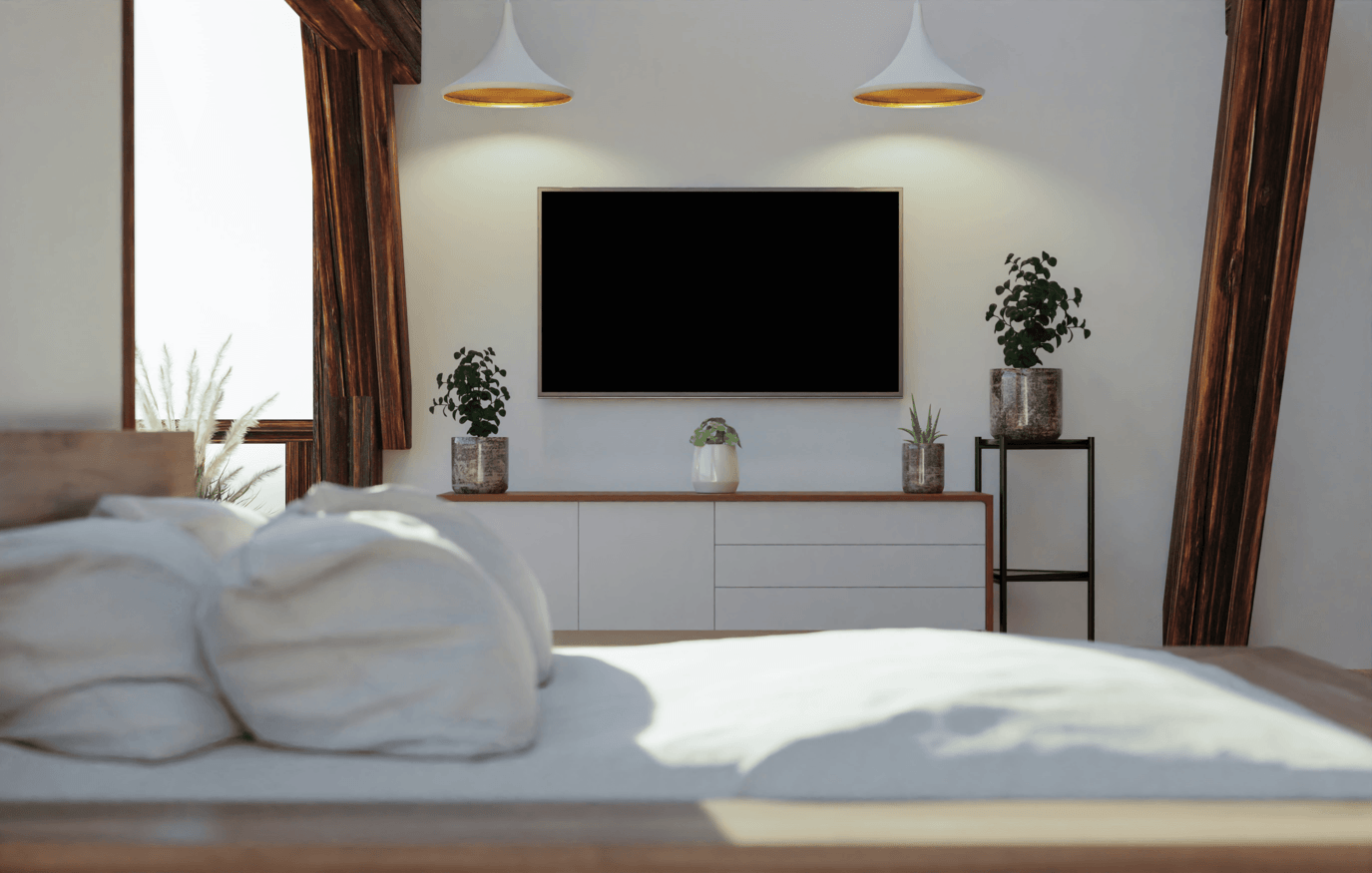 A serene furnished bedroom with a television and plants